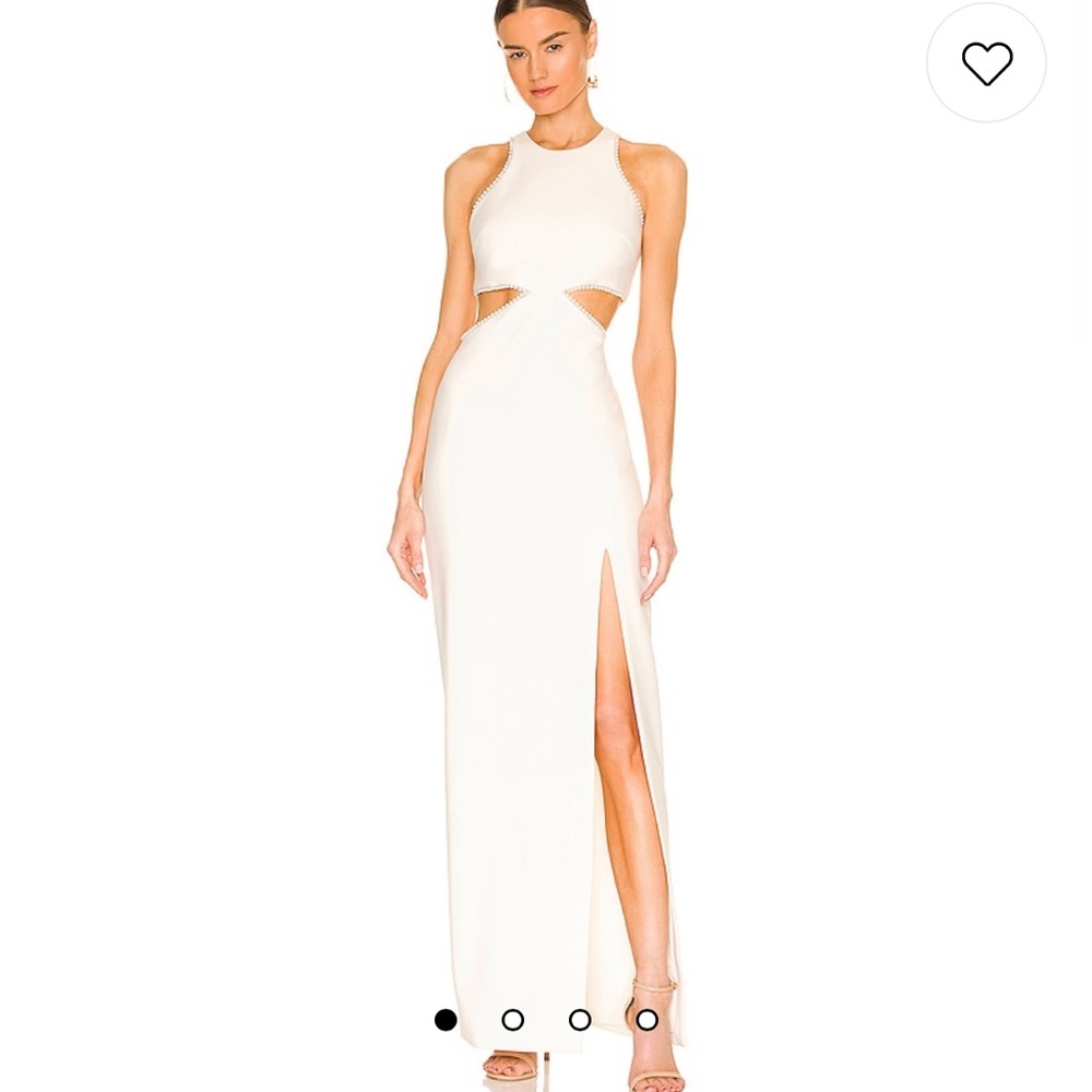 Likely gown in white with pearl detailing. Worn once and has been dry cleaned!